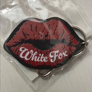 White Fox Catching Feels Keychain. New with tags sold out item